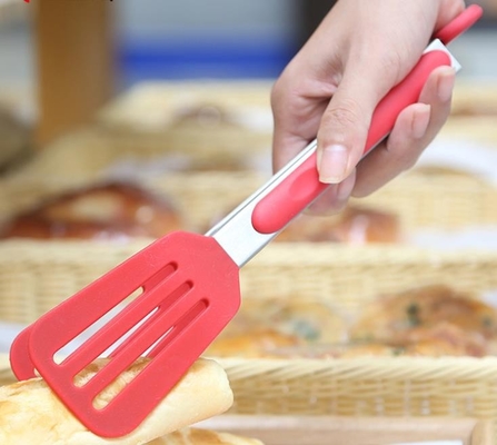 De ingelaste van de Keukenpunten van het Keerdersilicone van het de Douaneembleem Voor het drukken geschikte Spatel Tong